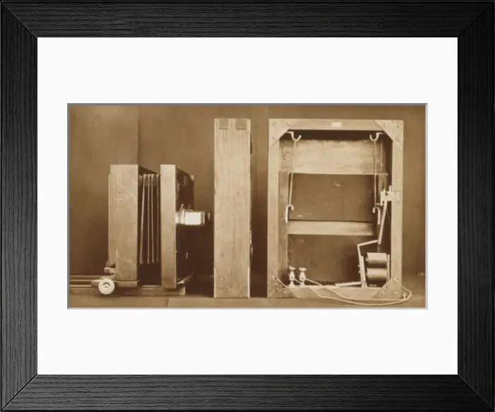 Framed Print : A photographing camera and back of electro-shutter Framed Print : A photographing camera and back of electro-shutter