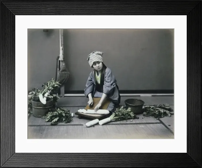 Framed Print : Girl cutting a Japanese radish Framed Print : Girl cutting a Japanese radish