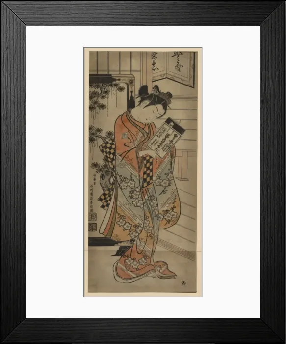 Framed Print : Beauty holding a book Framed Print : Beauty holding a book