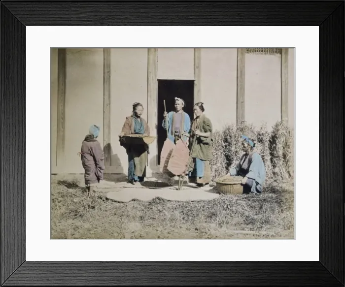 Framed Print : A group of people, possibly street vendors or farmers, two m Framed Print : A group of people, possibly street vendors or farmers, two m