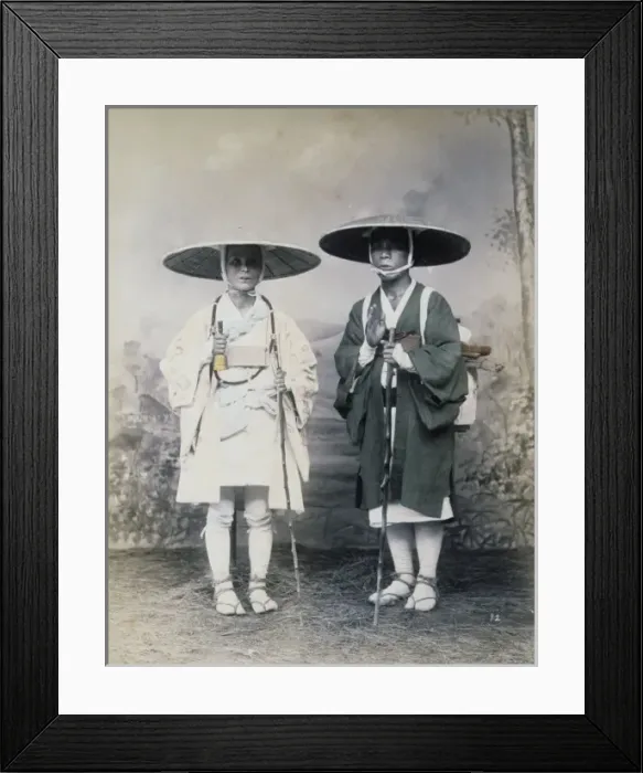 Framed Print : Two travelers with staffs, wearing hats, studio portrait Framed Print : Two travelers with staffs, wearing hats, studio portrait