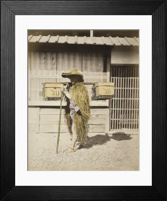 Framed Print : Porter wearing protective outer garments made of straw Framed Print : Porter wearing protective outer garments made of straw