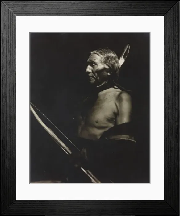Framed Print : Whitehawk. Photograph shows portrait of Native American man with feather in hair Framed Print : Whitehawk. Photograph shows portrait of Native American man with feather in hair
