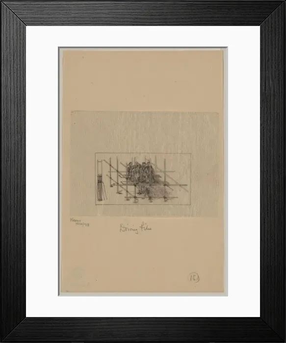 Framed Print : Driving piles