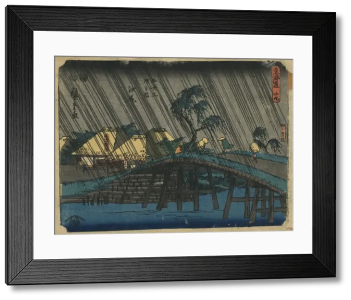 Framed Print : Ejiri. Print shows travelers crossing a bridge during a rain storm at the Framed Print : Ejiri. Print shows travelers crossing a bridge during a rain storm at the