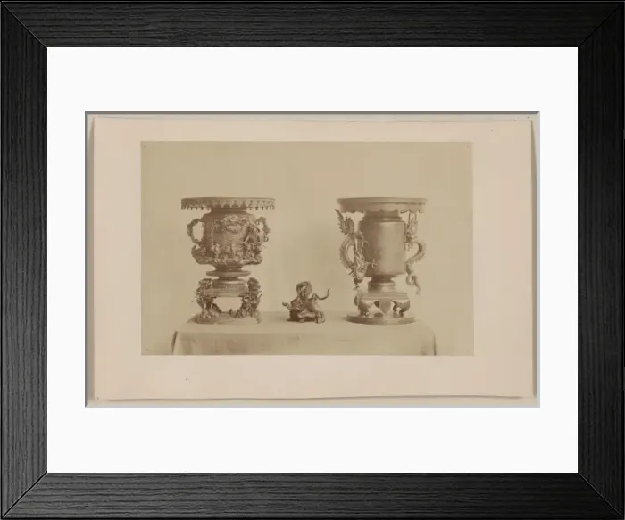 Framed Print : Tall, metal, ornate plant stands and figurine, all with drag Framed Print : Tall, metal, ornate plant stands and figurine, all with drag