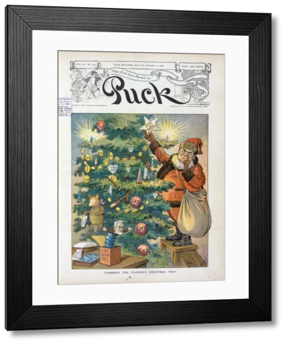 Framed Print : Trimming the Filipinos Christmas tree