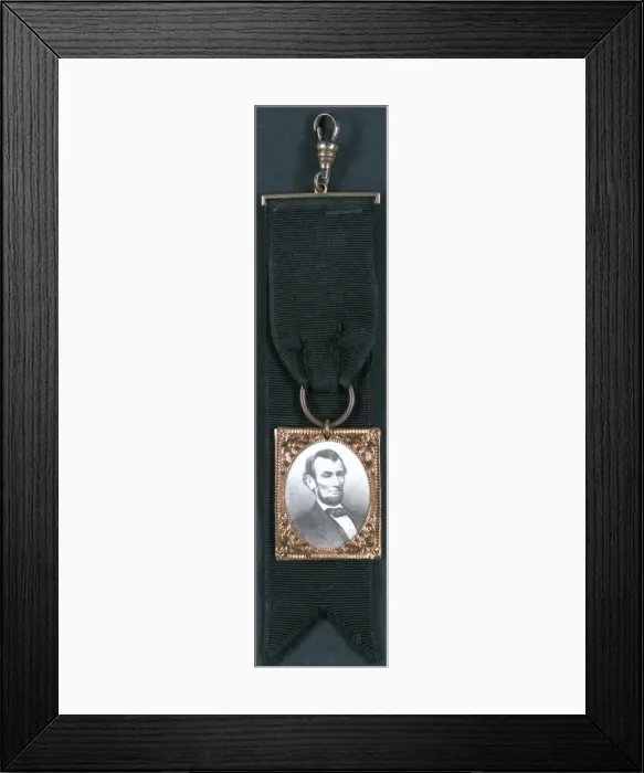 Framed Print : Portrait of Abraham Lincoln attached to black ribbon Framed Print : Portrait of Abraham Lincoln attached to black ribbon