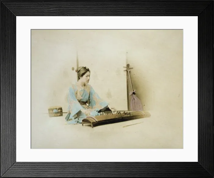 Framed Print : Japanese woman, full length, seated, facing right, playing a Framed Print : Japanese woman, full length, seated, facing right, playing a
