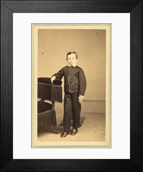 Framed Print : Tad Lincoln, standing, leaning against a chair Framed Print : Tad Lincoln, standing, leaning against a chair