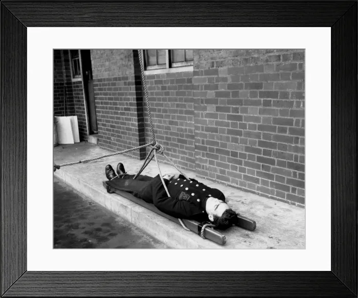 Framed Print : A scaling ladder rescue drill demonstration, WW2 Framed Print : A scaling ladder rescue drill demonstration, WW2