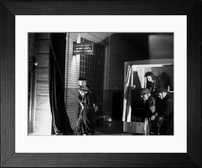 Framed Print : Blitz in London -- AFS personnel receiving treatment, WW2 Framed Print : Blitz in London -- AFS personnel receiving treatment, WW2