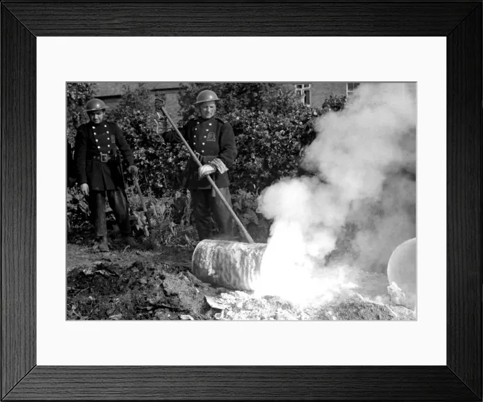 Framed Print : Firefighters deal with small fire caused by explosion, WW2 Framed Print : Firefighters deal with small fire caused by explosion, WW2