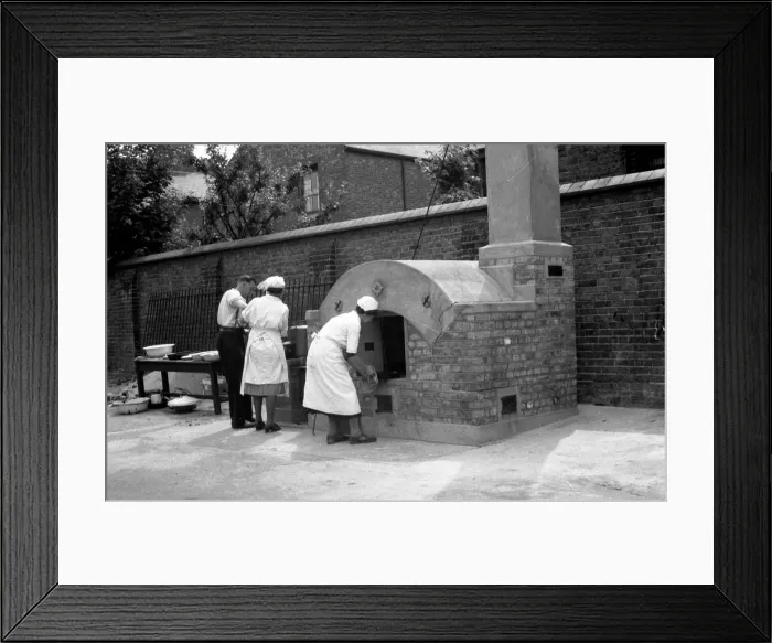 Framed Print : NFS sub-station with external baking oven in yard, WW2