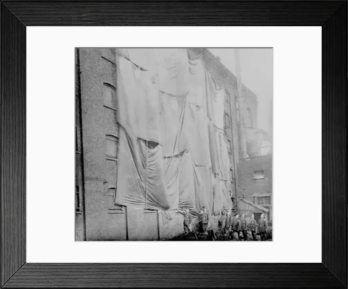 Framed Print : London Salvage Corps sheeting a warehouse wall Framed Print : London Salvage Corps sheeting a warehouse wall