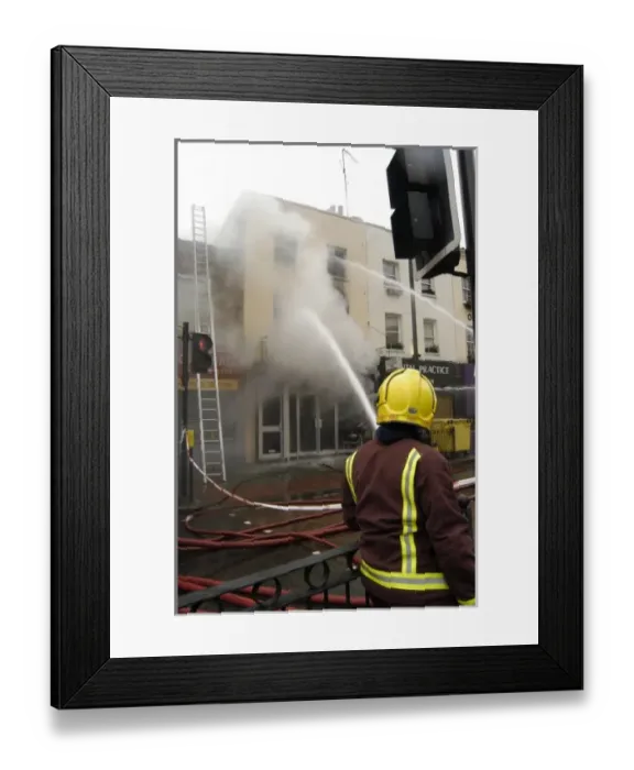 Framed Print : Firefighters at scene of fire, Stockwell Road, Brixton Framed Print : Firefighters at scene of fire, Stockwell Road, Brixton