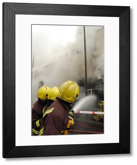 Framed Print : Firefighters at scene of fire, Stockwell Road, Brixton Framed Print : Firefighters at scene of fire, Stockwell Road, Brixton