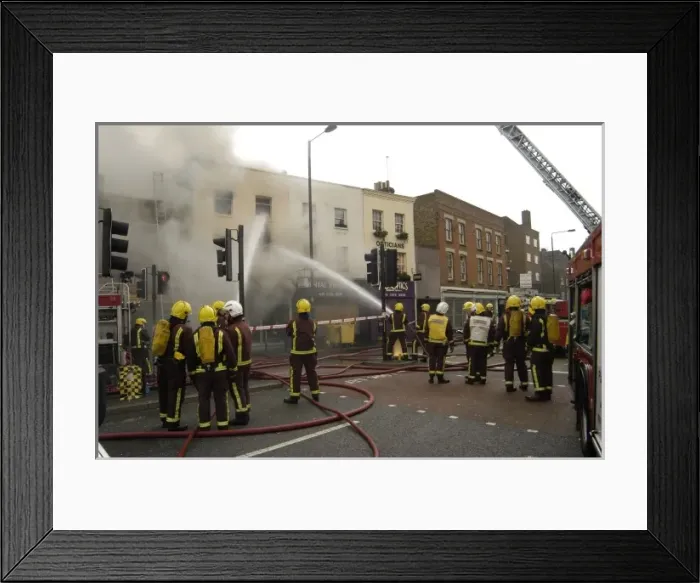 Framed Print : Firefighters at scene of fire, Stockwell Road, Brixton Framed Print : Firefighters at scene of fire, Stockwell Road, Brixton