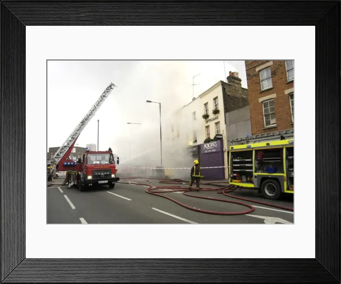 Framed Print : Firefighters at scene of fire, Stockwell Road, Brixton Framed Print : Firefighters at scene of fire, Stockwell Road, Brixton