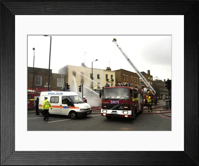Framed Print : Firefighters at scene of fire, Stockwell Road, Brixton Framed Print : Firefighters at scene of fire, Stockwell Road, Brixton