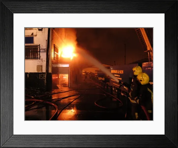 Framed Print : Firefighters attending fire at commercial premises Framed Print : Firefighters attending fire at commercial premises