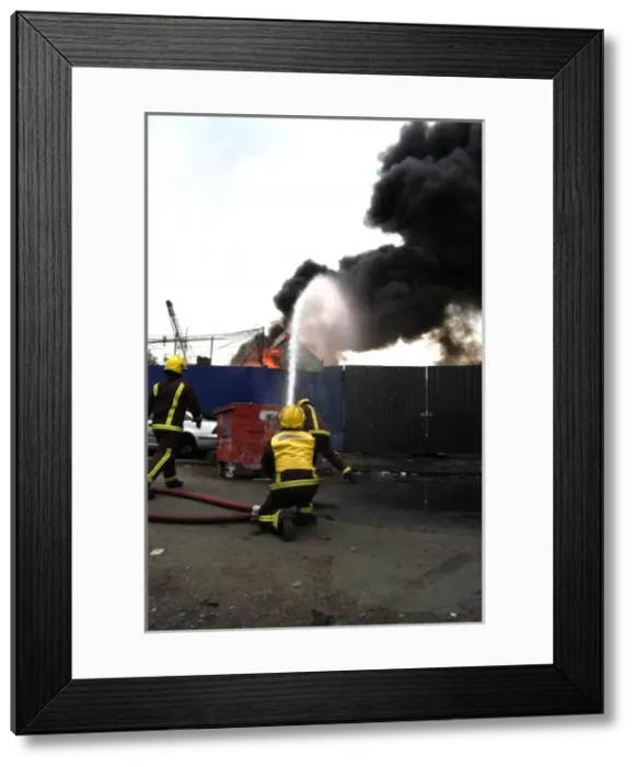 Framed Print : London Fire Brigade firefighters respond to a fire Framed Print : London Fire Brigade firefighters respond to a fire