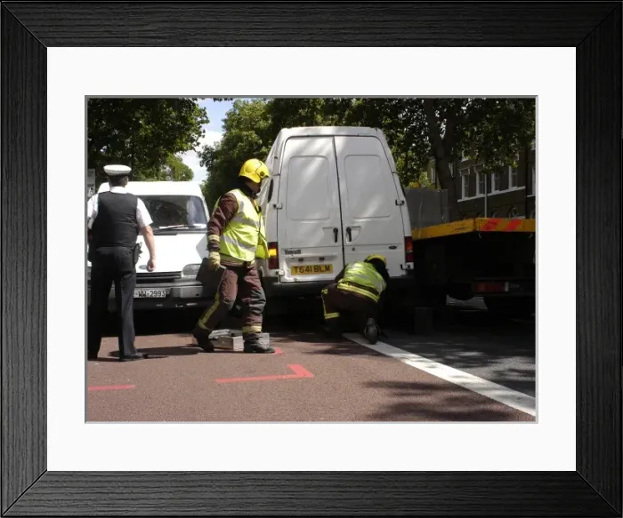 Framed Print : Firefighters inspecting a broken down Ford transit van Framed Print : Firefighters inspecting a broken down Ford transit van