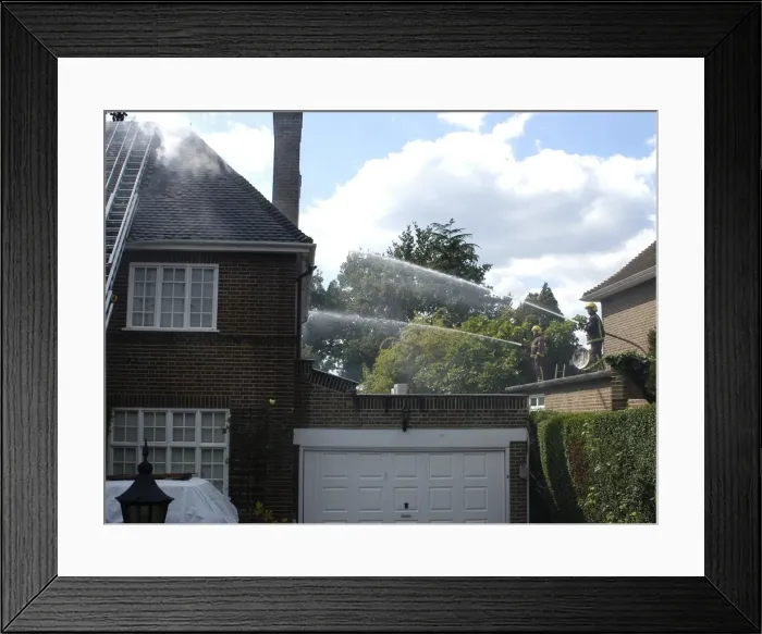 Framed Print : Firefighters respond to a house fire, North London Framed Print : Firefighters respond to a house fire, North London