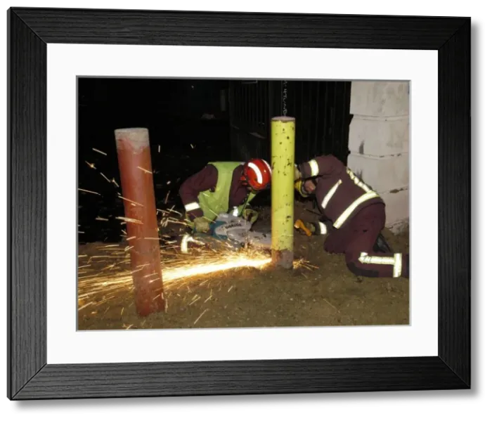 Framed Print : Firefighters using cutting equipment, SE London Framed Print : Firefighters using cutting equipment, SE London