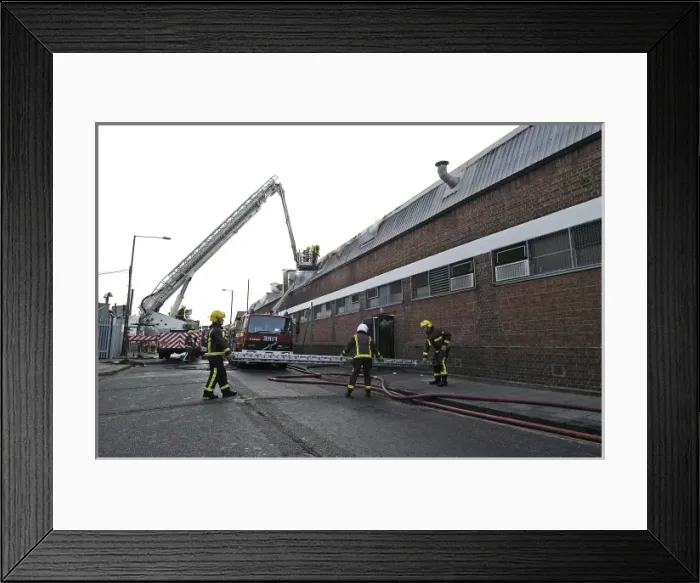 Framed Print : Firefighters in a hydraulic lift at a fire on West Road Framed Print : Firefighters in a hydraulic lift at a fire on West Road