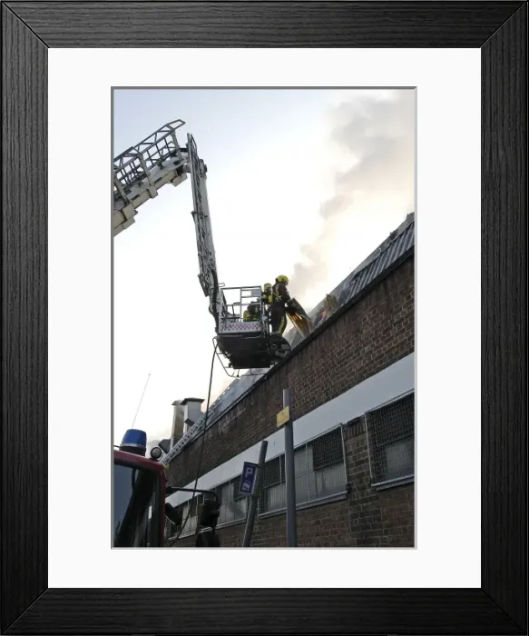 Framed Print : Firefighters in a hydraulic lift at a fire on West Road Framed Print : Firefighters in a hydraulic lift at a fire on West Road