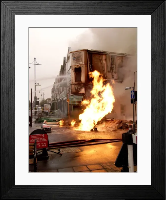 Framed Print : Firefighters at the scene of an explosion Framed Print : Firefighters at the scene of an explosion