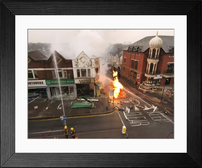 Framed Print : Firefighters at the scene of an explosion Framed Print : Firefighters at the scene of an explosion