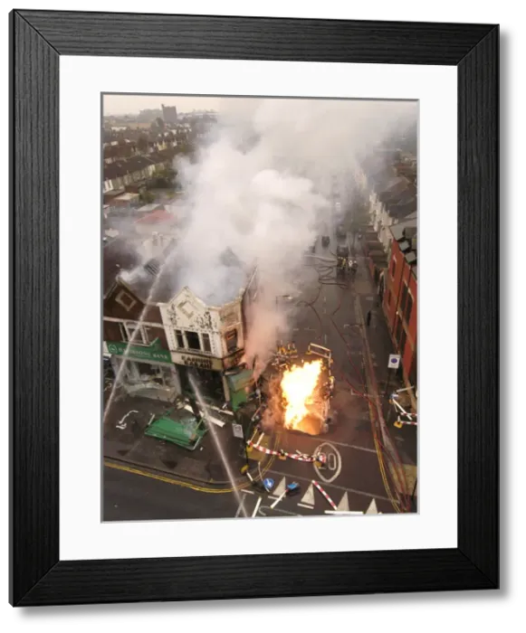 Framed Print : Firefighters at the scene of an explosion Framed Print : Firefighters at the scene of an explosion