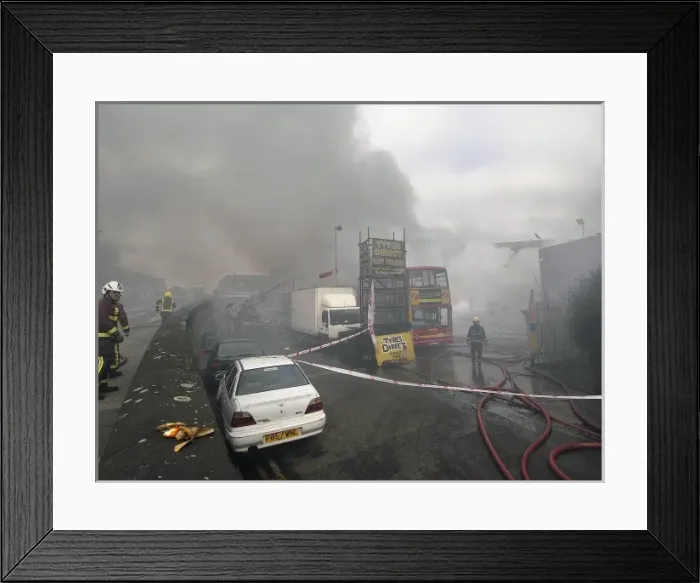 Framed Print : Firefighters attend fire at bus garage Framed Print : Firefighters attend fire at bus garage