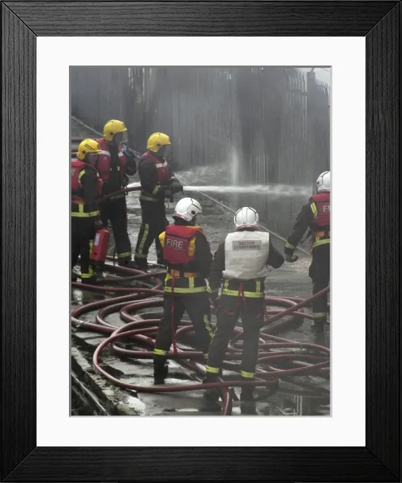 Framed Print : Firefighters attend fire at bus garage Framed Print : Firefighters attend fire at bus garage