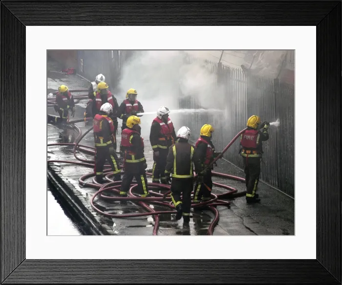 Framed Print : Firefighters attend fire at bus garage Framed Print : Firefighters attend fire at bus garage