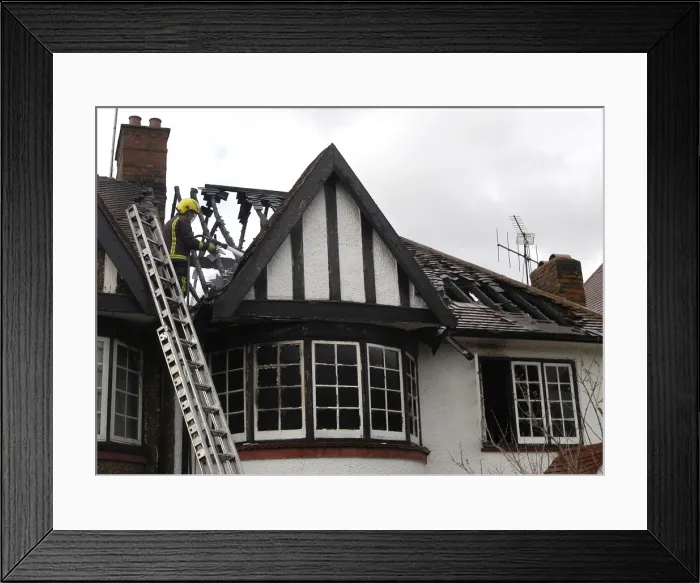 Framed Print : Firefighters dealing with a house fire Framed Print : Firefighters dealing with a house fire