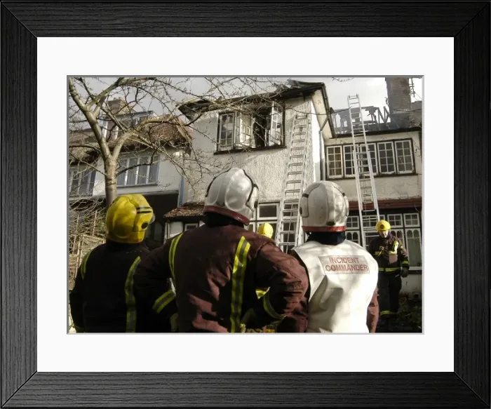 Framed Print : Firefighters dealing with a house fire Framed Print : Firefighters dealing with a house fire