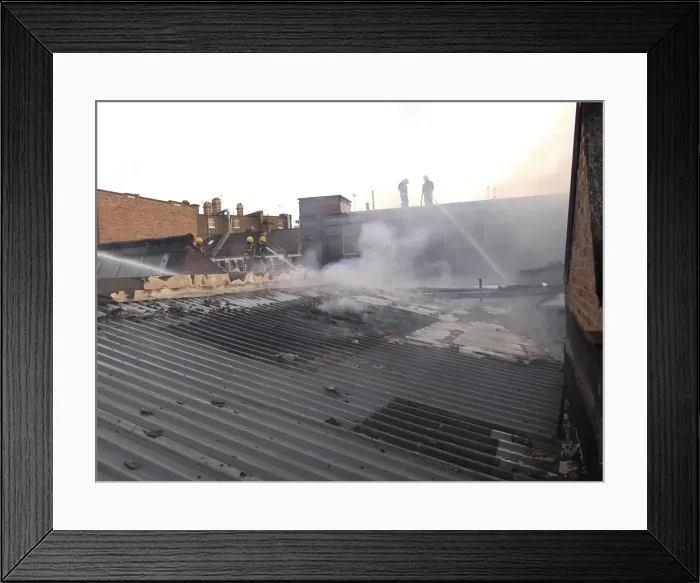Framed Print : Firefighters at scene of commercial premises fire Framed Print : Firefighters at scene of commercial premises fire