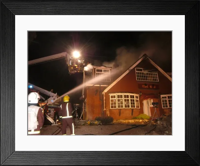 Framed Print : Firefighters working at scene of restaurant fire Framed Print : Firefighters working at scene of restaurant fire