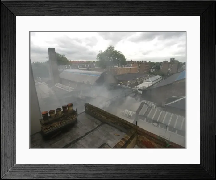 Framed Print : Firefighters working at scene of commercial fire Framed Print : Firefighters working at scene of commercial fire