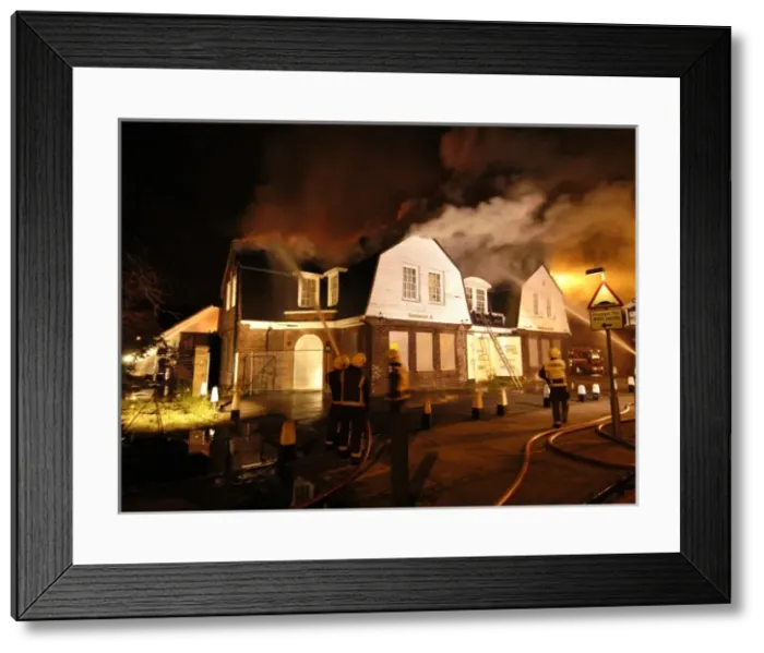 Framed Print : Firefighters working at scene of pub fire, SE London Framed Print : Firefighters working at scene of pub fire, SE London