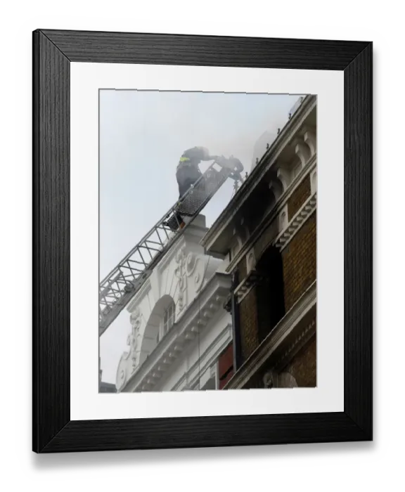 Framed Print : Firefighters using turntable ladder Framed Print : Firefighters using turntable ladder