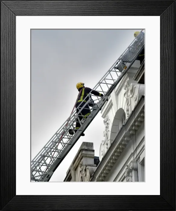 Framed Print : Firefighters using turntable ladder Framed Print : Firefighters using turntable ladder