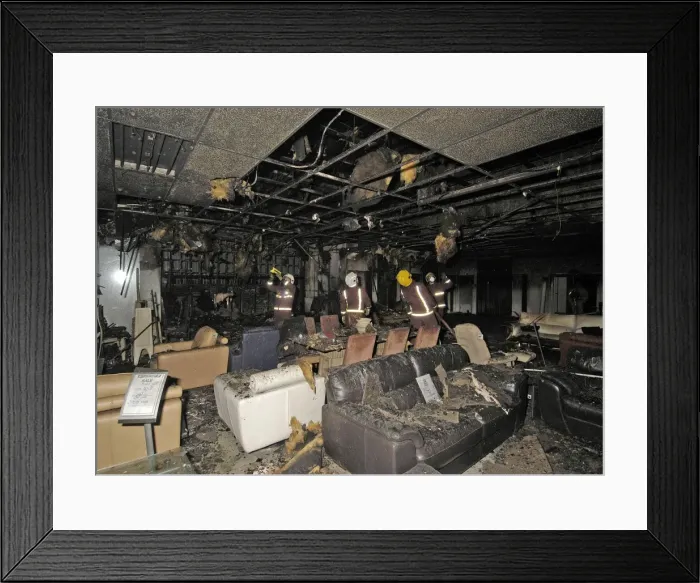 Framed Print : Firefighters at the scene of a fire in a furniture shop Framed Print : Firefighters at the scene of a fire in a furniture shop