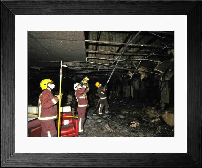 Framed Print : Firefighters at the scene of a fire in a furniture shop Framed Print : Firefighters at the scene of a fire in a furniture shop
