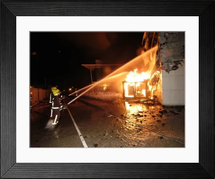 Framed Print : Firefighters working at scene of large warehouse fire Framed Print : Firefighters working at scene of large warehouse fire