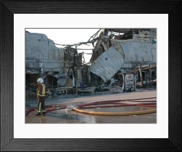 Framed Print : Aftermath of a fire at warehouse in Bow, East London Framed Print : Aftermath of a fire at warehouse in Bow, East London