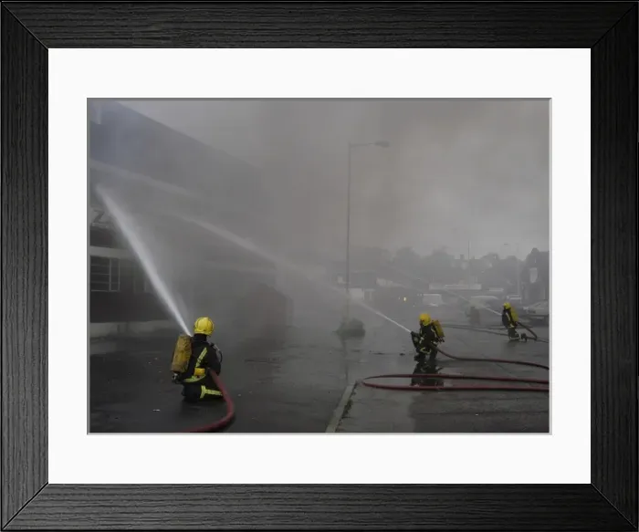 Framed Print : Firefighters at scene of commercial premises fire Framed Print : Firefighters at scene of commercial premises fire